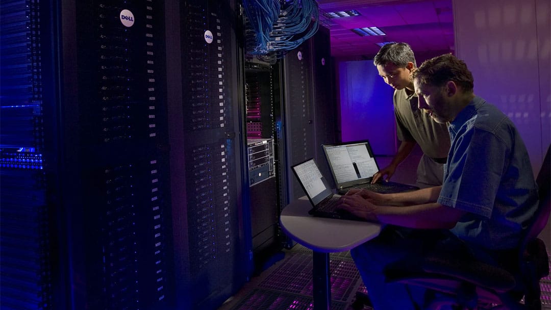 Technicians monitoring a data center infrastructure