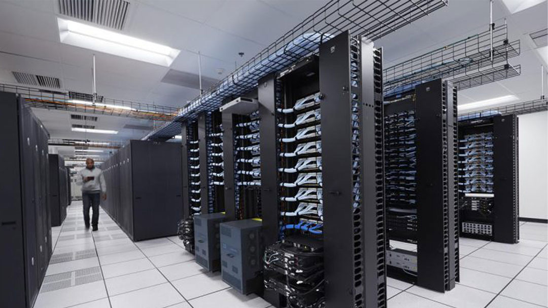 Man monitoring data center energy consumption