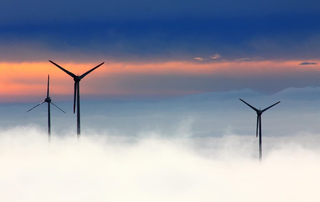 windmills clouds fog wind power photo