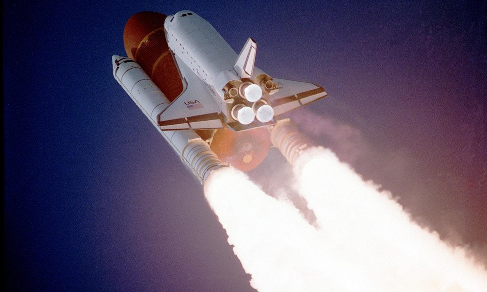 The space shuttle launching into space