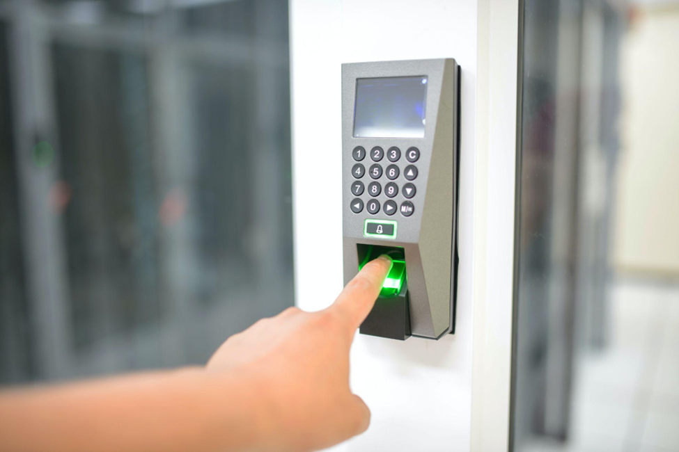 a person using a biometric access control system