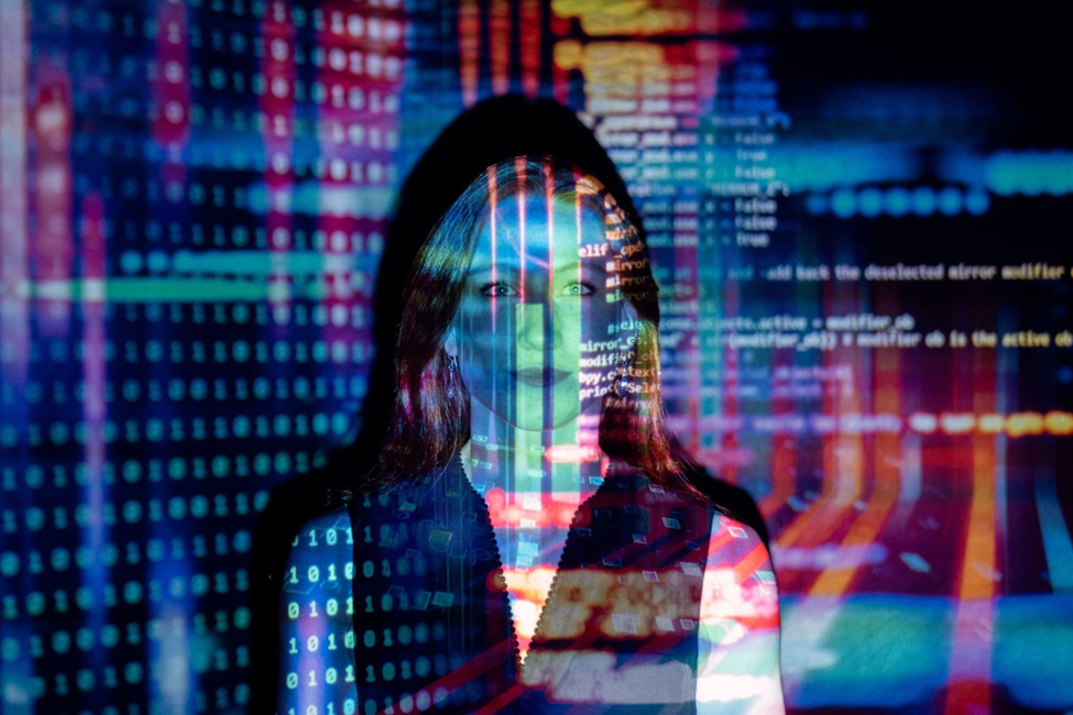 A woman with data projected on her