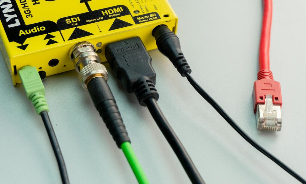  Various Types of Cables and a Yellow Hub