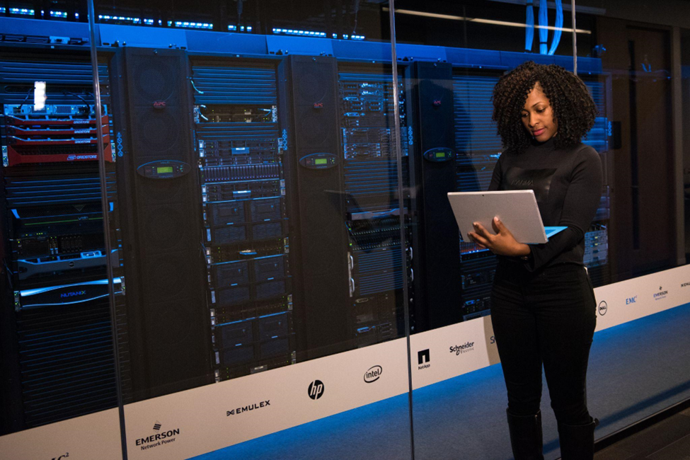 a woman working in a data center
